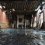 A picture shows the inside of the city hall in the historic French port of La Rochelle, southwestern France, on June 29, 2013 after a fire swept through it's roof on the eve, destroying a part of the listed 15th-Century building. The blaze erupted in the reception room of the richly decorated Renaissance building, considered to be one of the most spectacular town halls in France. AFP PHOTO / XAVIER LEOTY