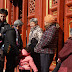 Grandmothers and grandchildren at the Yonghegong Temple in Beijing