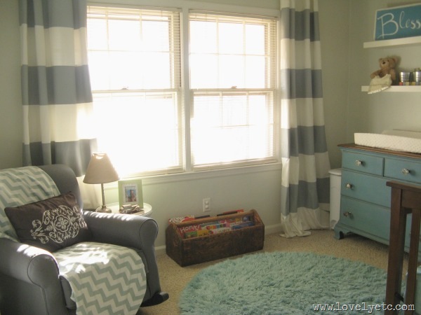 nursery with striped curtains