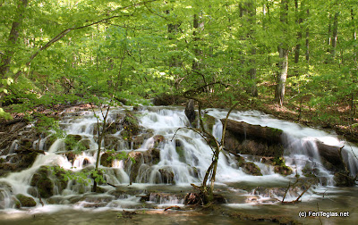 beautiful waterfall in mountains during the spring