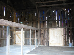 A view of the finished interior with pegged planks in the drive and three inch thick planks clear-spanning in the stanchion bay.