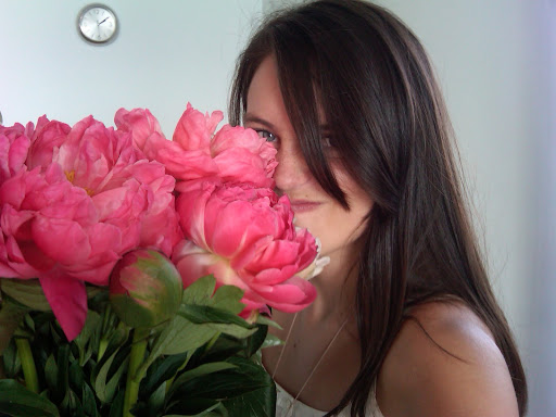 My expression doesn't quite convey the sweet smell of the peonies.