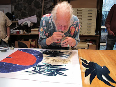softening the printed ink with solvent