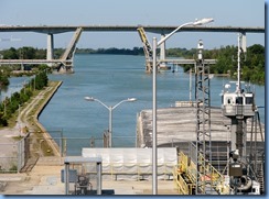 7960 St. Catharines - Welland Canal Lock 3 - Viewing Platform - WILF SEYMOUR tug and her barge ALOUETTE SPIRIT downbound Homer Lift Bridge and Garden City Skyway in background 7960 St. Catharines - Welland Canal Lock 3 - Viewing Platform - WILF SEYMOUR tug and her barge ALOUETTE SPIRIT downbound Homer Lift Bridge and Garden City Skyway in background