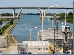 7960 St. Catharines - Welland Canal Lock 3 - Viewing Platform - WILF SEYMOUR tug and her barge ALOUETTE SPIRIT downbound Homer Lift Bridge and Garden City Skyway in background