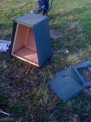 Removing the front of the box to give access to the bolts for tightening up once in place.