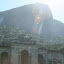 A beautiful colonial house in the middle of the park, with Crocovado (The famous Christ the Redeemer statue is on top of this mountain) in the background.
