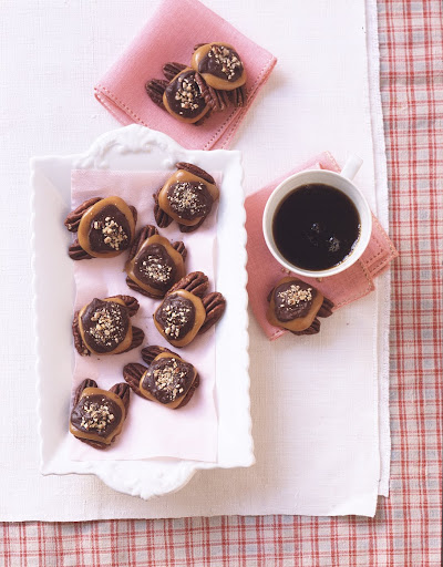 Chocolate-caramel pecan clusters, perfect for serving with cocktails before dinner. (Martha Stewart Living) Chocolate-caramel pecan clusters, perfect for serving with cocktails before dinner. (Martha Stewart Living)