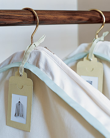 Digital pictures, tucked into card-stock tags with windows, identify the contents inside each garment bag so you don't have to waste time opening the bags and pulling the contents out to see what's inside.