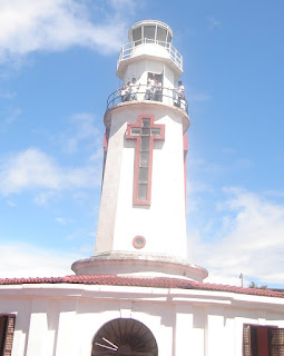 Students climb the top of old Corregidor lighthouse.