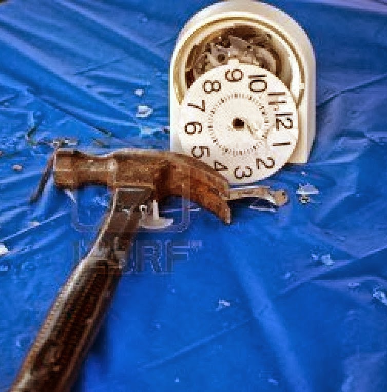 [3385988-hammer-and-smashed-alarm-clo.jpg]