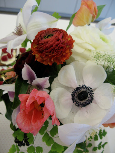 Senior style editor Naomi deMañana made the gorgeous arrangements using poppies, maidenhair fern, ivy berries, clematis, Queen Anne’s Lace, anemones, and ranunculus. Senior style editor Naomi deMañana made the gorgeous arrangements using poppies, maidenhair fern, ivy berries, clematis, Queen Anne’s Lace, anemones, and ranunculus.