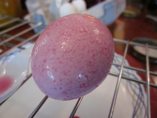 The beet dyed eggs were pink and speckled.