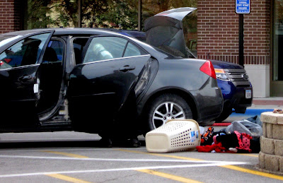 The vehicle's contents were cleared out onto the street