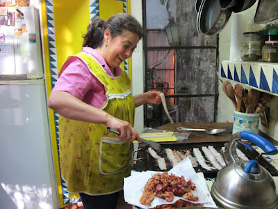 a final breakfast, Angelica cooks with a  smile!