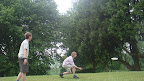 George and David playing frisbee