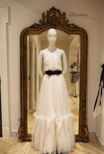One of the beautiful dresses from their fall line. This features tulle with polka dots and a black bow belt.