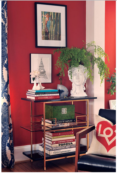 red walls with gold accents by Jamie Meares