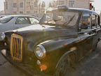 Old London taxi outside the Black Market