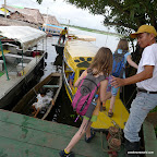 We board our narrow yellow boat with herman, our guide.
