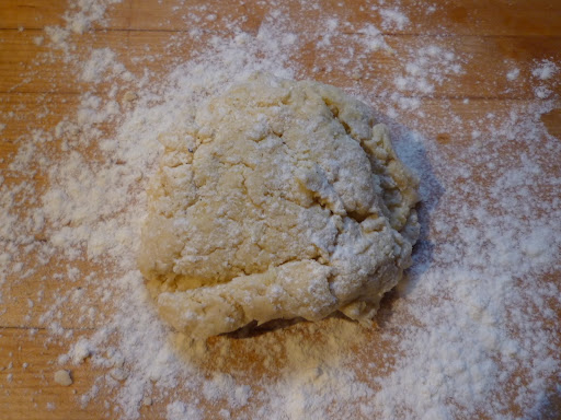 Biscuit dough mixed in bowl, ready to be kneaded just a few times.