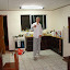 Sebastian in the kitchen dancing and singing.