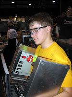 A student controlling the controls to the field