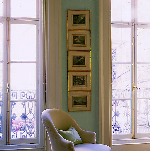In the thin vertical space between two tall windows, a little piece could get lost. These five eighteenth-century landscape prints use the awkward space cleverly: Hung frame to frame, they function as one. In the thin vertical space between two tall windows, a little piece could get lost. These five eighteenth-century landscape prints use the awkward space cleverly: Hung frame to frame, they function as one.