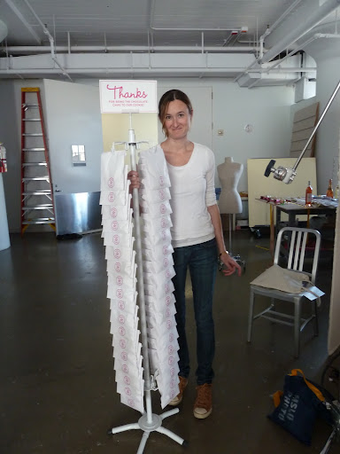 Here's Genevieve, our art director, with an alternate version of the chip clip stand. This thing was tall!