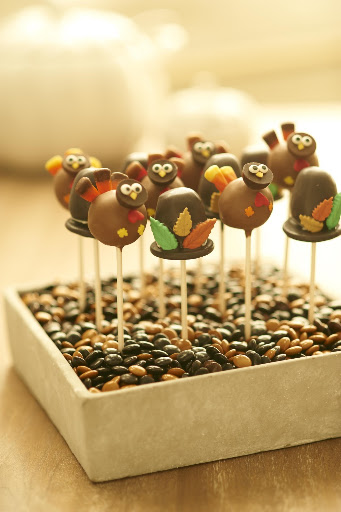 Thanksgiving themed cake pops from NYCake Pops, www.nycakepops.com. presented in a vessel filled with candy make will be a huge hit with your kids Thanksgiving themed cake pops from NYCake Pops, www.nycakepops.com. presented in a vessel filled with candy make will be a huge hit with your kids