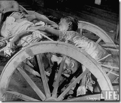Corpses lying in a cart on their way to be cremated after bloody rioting between Hindus and Muslims