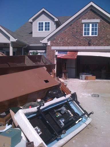 Despite being damaged by the flood, this neighbor hung their flag proudly.