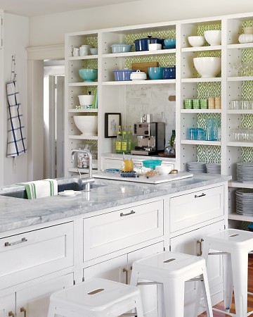 The bright white of this kitchen pairs beautifully with the ikat patterned wallpaper from China Seas. (Annie Schlecter/Marthastewart.com) The bright white of this kitchen pairs beautifully with the ikat patterned wallpaper from China Seas. (Annie Schlecter/Marthastewart.com)