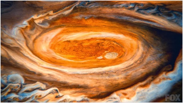A spectacular digital fly-by of Jupiter in COSMOS.