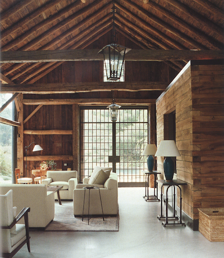 Inside this barn-turned-pool house features polished cement floors and steel and glass siding doors. Inside this barn-turned-pool house features polished cement floors and steel and glass siding doors.