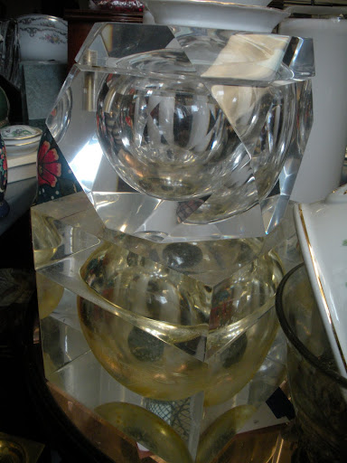 I love the angular shape of these lucite ice buckets.