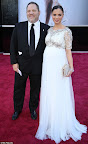 Designer Georgina Chapman of Marchesa, in Marchesa, and her husband, producer Harvey Weinstein. Designer Georgina Chapman of Marchesa, in Marchesa, and her husband, producer Harvey Weinstein.