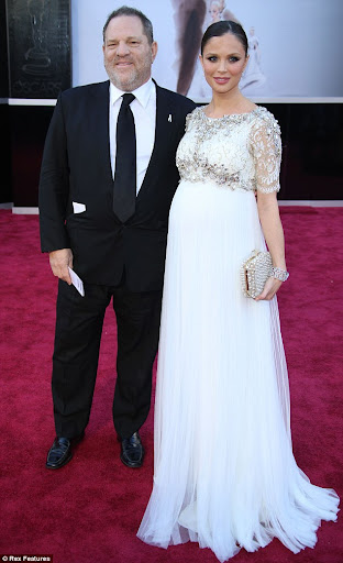 Designer Georgina Chapman of Marchesa, in Marchesa, and her husband, producer Harvey Weinstein. Designer Georgina Chapman of Marchesa, in Marchesa, and her husband, producer Harvey Weinstein.
