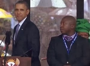 [Barack-Obama-fake-interpreter-Nelson-Mandela-funeral-300x220%255B6%255D.jpg]