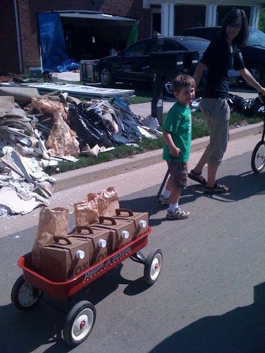 Little Parker helped by delivering coffee and bagels.