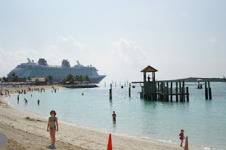 Looking back down the family beach at the ship.  In the center is a play area to climb and swing into the water.  A life guard is there at all times.
