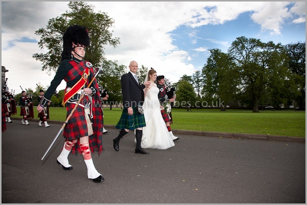 pipe band lead bride and groom to dinner