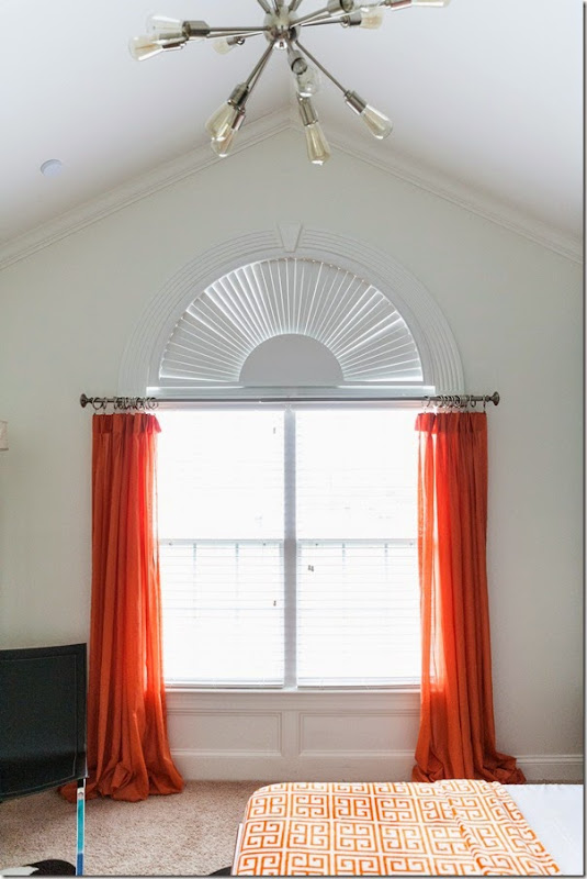 guest bedroom makeover white and bright with a pop of orange