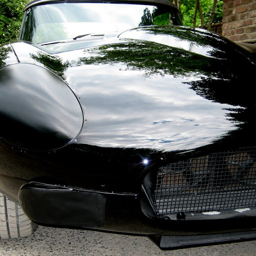 Prototype Jaguar XK-E, with Head-Light-Cover-Kit. The Head-Lamp-Cover Conversion-Kit made by designer Stefan Wahl in the tradition of Malcolm Sayer. / Jaguar e-Type mit Scheinwerferabdeckungen, designed und hergestellt von Designer Stefan Wahl in der Tradition von Malcolm Sayer.