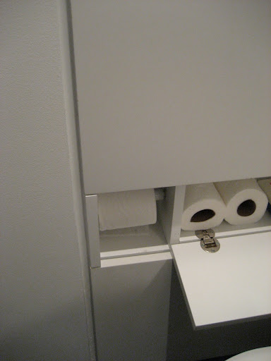 Toilet paper is cleverly stored in its own compartment. Toilet paper is cleverly stored in its own compartment.