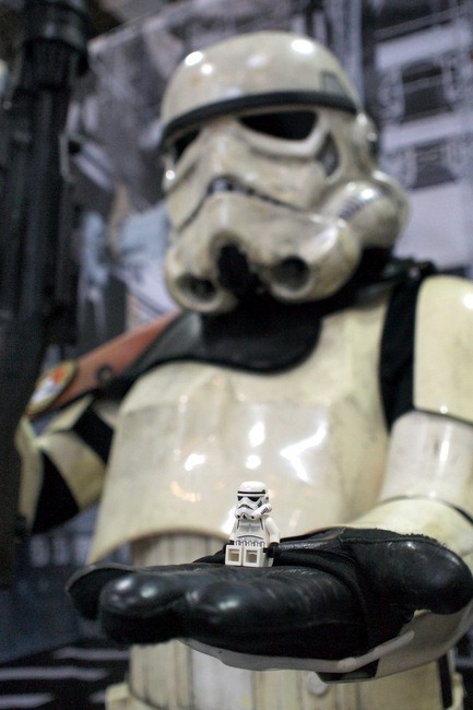Minifig-Stormtrooper-in-hands-of-Real-life-Stormtrooper