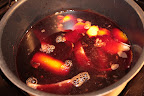 With orange and apple slices