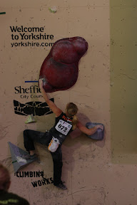 Another climber taking part in the IFSC Bouldering World Cup.
