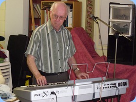Peter Brophy accompanying one of the other keyboards.