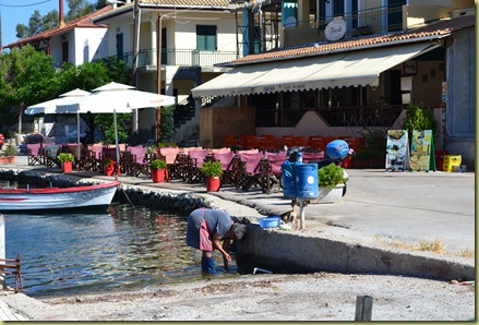 Vathy Harbour cleaning fish